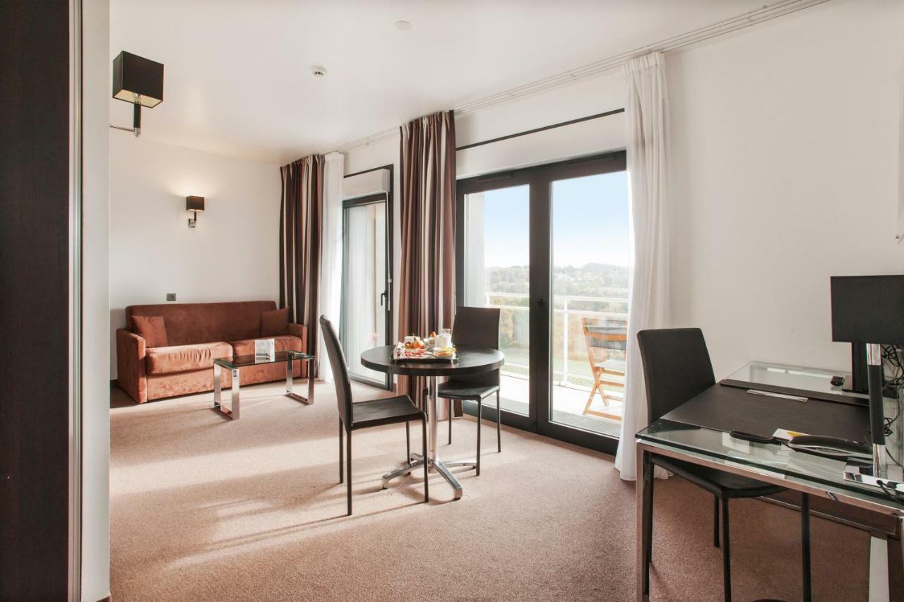 Golden Tulip Pornic Suites- Appart Hotel Bagian luar foto